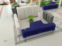 Image d'un espace de bureau avec des magnets armoires, des bureaux d'angles et une table ronde pour plan en impression 3D